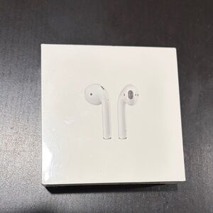 Apple AirPods with Charging Case in White BRAND NEW never opened!